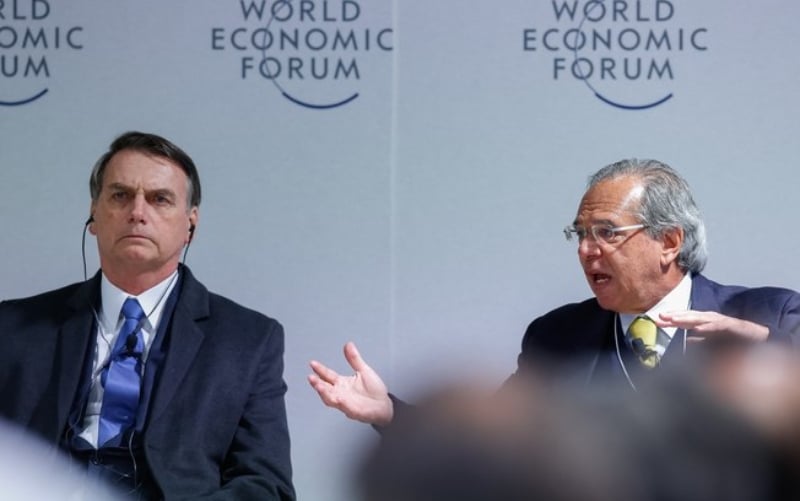 Bolsonaro e Paulo Guedes, ministro da Economia, durante o  Fórum de Davos, em janeiro de 2019. Alan Santos / PR[/fotografo]