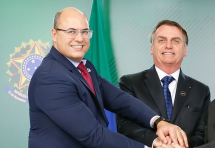 Bolsonaro trocou de cadeira para se afastar do governador Witzel
[Foto: Carolina Antunes/PR]