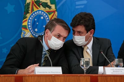 Luiz Henrique Mandetta e Jair Bolsonaro durante coletiva de imprensa, em  18/03/2020. Foto: Carolina Antunes/PR