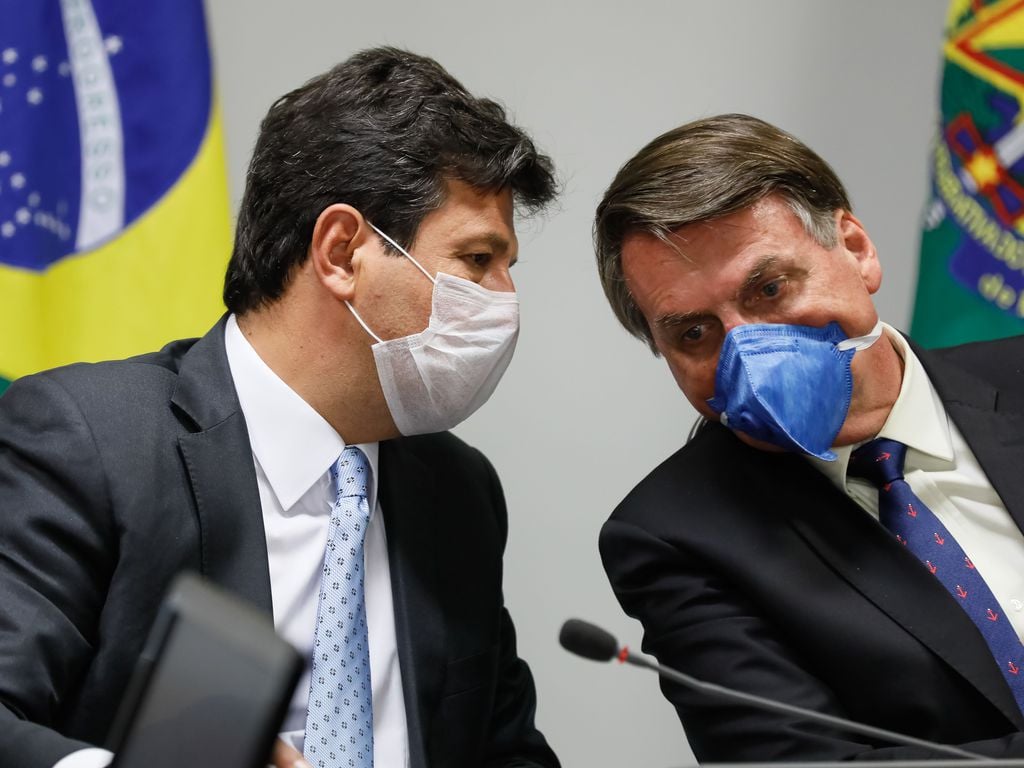 Luiz Henrique Mandetta e o presidente da República, Jair Bolsonaro, em videoconferência com representantes da Iniciativa Privada, em 20 de março. [fotografo] Isac Nóbrega/PR [/fotografo] 