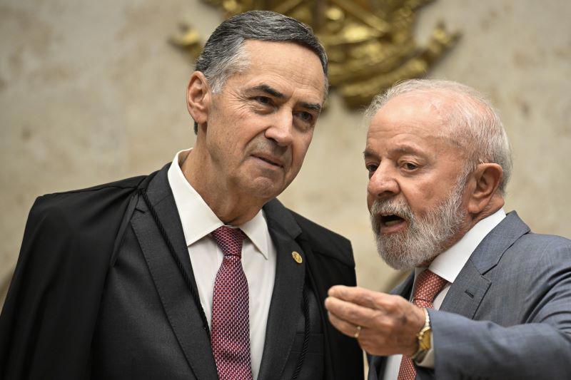 O presidente do STF, Luís Roberto Barroso, com o presidente Lula