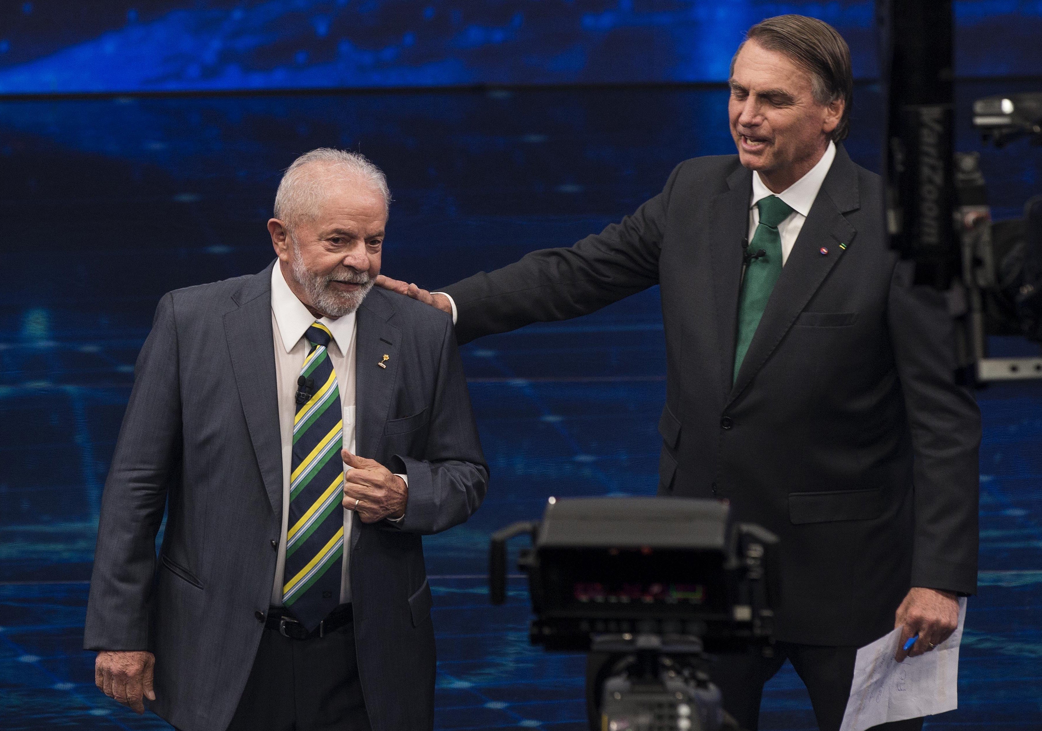 Lula e Bolsonaro durante debate da Band em 2022